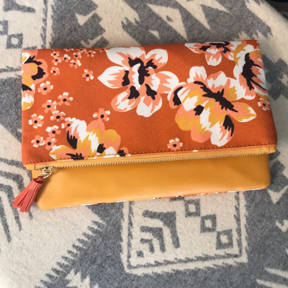 Rachel Pally, reversible clutch.